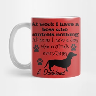 The funny dog ​​controls me its a dachshund Mug